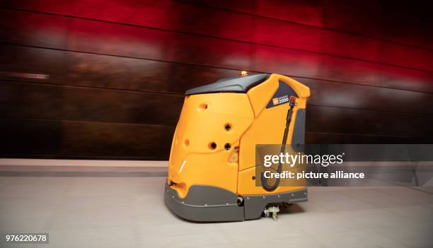 June 2018, Germany, Hamburg: An autonomous cleaning robot called 'Taski Swingobot 2000' drives across the U-Bahn station 'Hafencity Universitaet'...