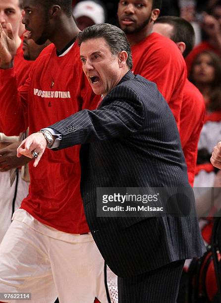 Head coach Rick Pitino of the Louisville Cardinals reacts from the bench against the Cincinnati Bearcats during the second round of 2010 NCAA Big...