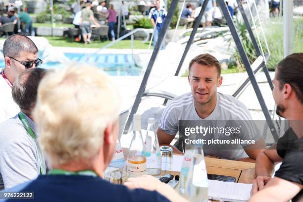 June 2018, Italy, Eppan: Soccer, National Team of Germany, Media Day, Training Camp for World Cup 2018 Preparation. Goal Keeper Manuel Neuer gives...