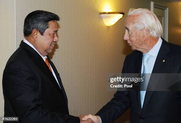 Indonesian President Susilo Bambang Yudhoyono greets Paul Ramsay from Ramsay Health, during a meeting with business leaders prior to attending a...