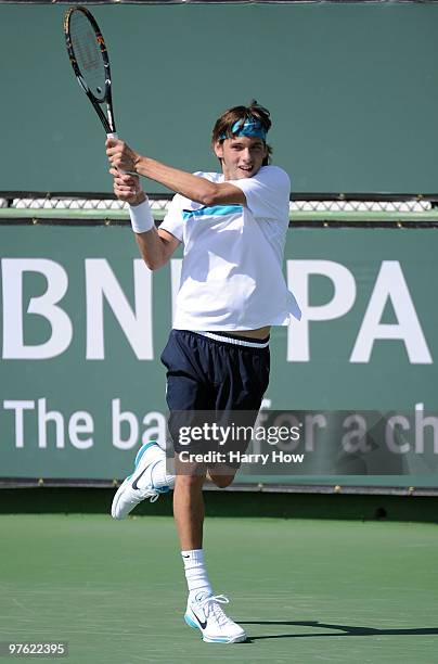 Filip Krajinovic of Serbia returns a backhand during the BNP Paribas Open at the Indian Wells Tennis Garden on March 10, 2010 in Indian Wells,...
