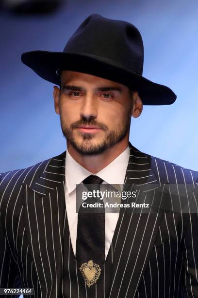 Model walks the runway at the Dolce & Gabbana show during Milan Men's Fashion Week Spring/Summer 2019 on June 16, 2018 in Milan, Italy.