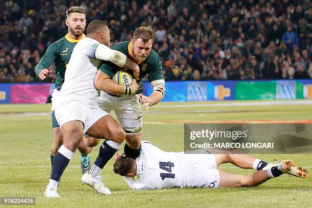 South Africa's number eight Duane Vermeulen is tackled during the second test match South Africa vs England at the Free State Stadium in...