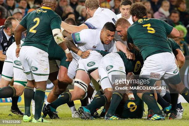 England's prop Mako Vunipola and England's flanker Brad Shields push the English maul during the second test match South Africa vs England at the...