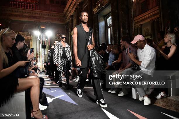 Model presents a creation for fashion house Les Hommes during the Men's Spring/Summer 2019 fashion shows in Milan, on June 16, 2018.