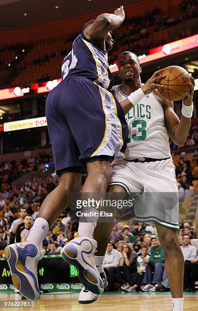 Sheldon Williams of the Boston Celtics tries to get around Hasheem Thabeet of the Memphis Grizzlies on March 10, 2010 at the TD Garden in Boston,...