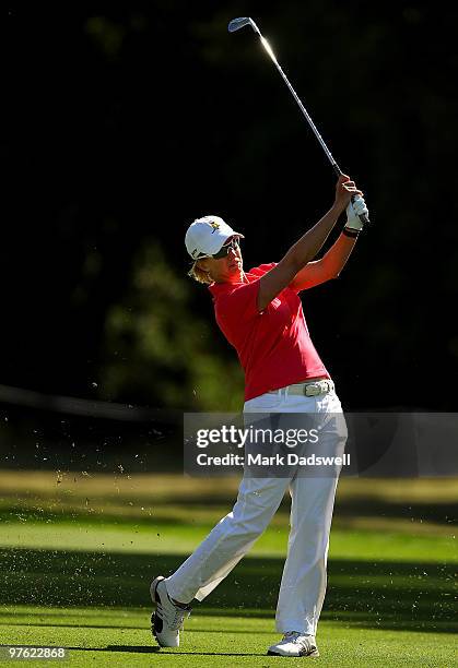 Karrie Webb of Australia hits her second shot on the 16th hole during round one of the 2010 Women's Australian Open at The Commonwealth Golf Club on...