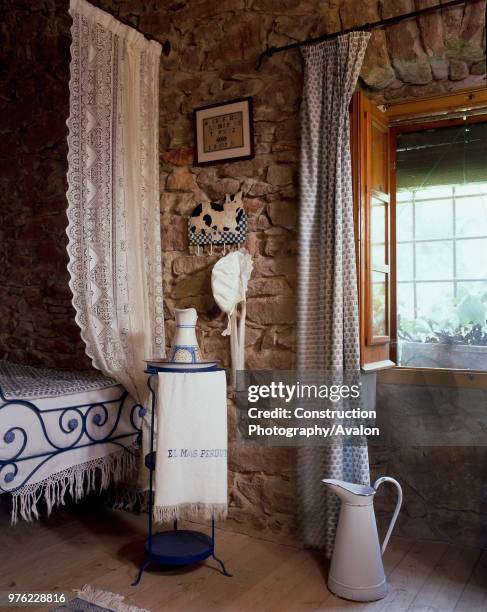 View of a washbowl in a bedroom.