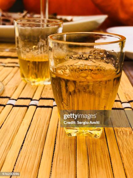 two glasses of lithuanian sweet wine - sergio amiti stock pictures, royalty-free photos & images