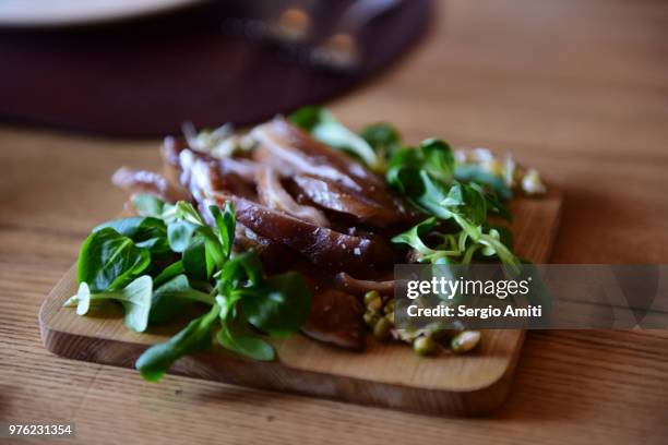 kiaulės ausis, pig's ear snack - sergio amiti stock pictures, royalty-free photos & images