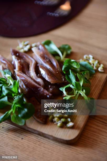 kiaulės ausis, pig's ear snack - sergio amiti stock pictures, royalty-free photos & images