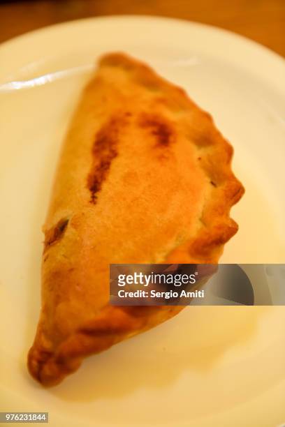 kibinai, pastry filled with mutton and onion - sergio amiti stock pictures, royalty-free photos & images