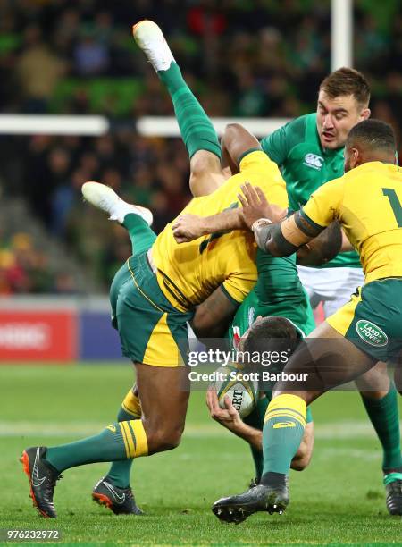 Marika Koroibete of the Wallabies tackles Ireland's Rob Kearney and is shown the yellow card after this tackle during the International test match...