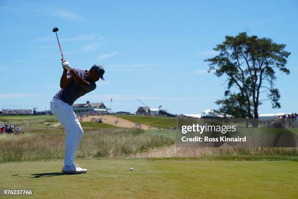 Tony Finau of the United States plays his shot from the ninth tee during the third round of the 2018 U.S. Open at Shinnecock Hills Golf Club on June...