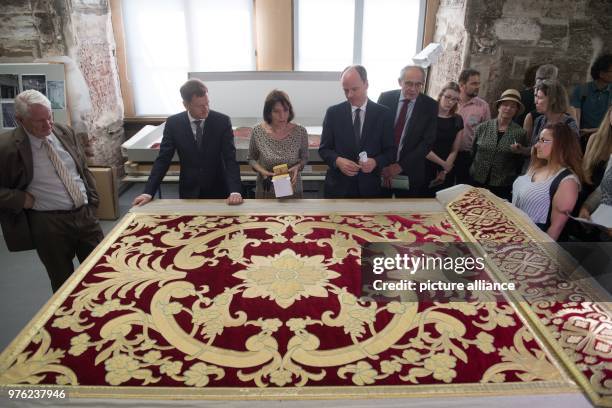 June 2018, Germany, Dresden: Art historian Sabine Schneider standing with Michael Kretschmer , Premier of Saxony, and Matthias Hass , Minister of...