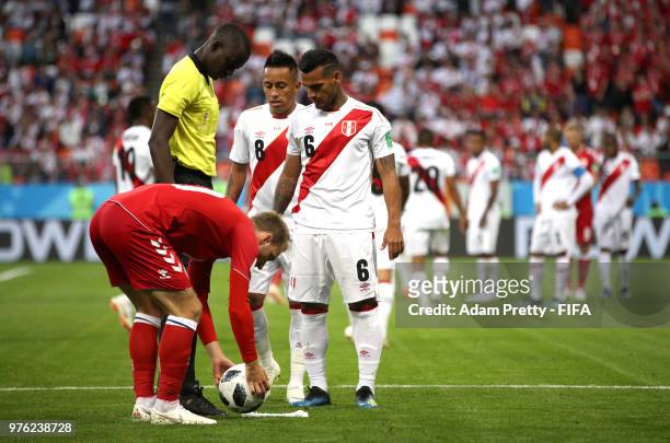 Christian Eriksen of Denmark places the ball ready to take a free kick during the 2018 FIFA World Cup Russia group C match between Peru and Denmark...