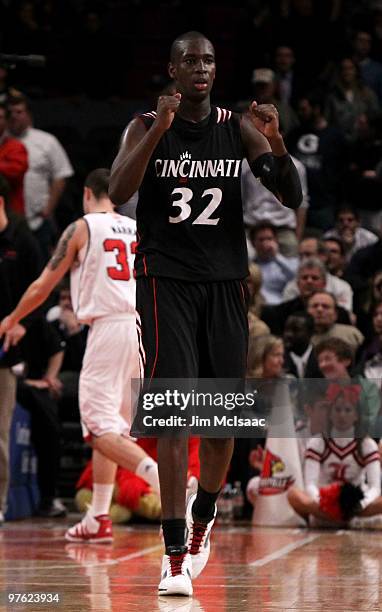 Ibrahima Thomas of the Cincinnati Bearcats celebrates after defeating the Louisville Cardinals during the second round of 2010 NCAA Big East...