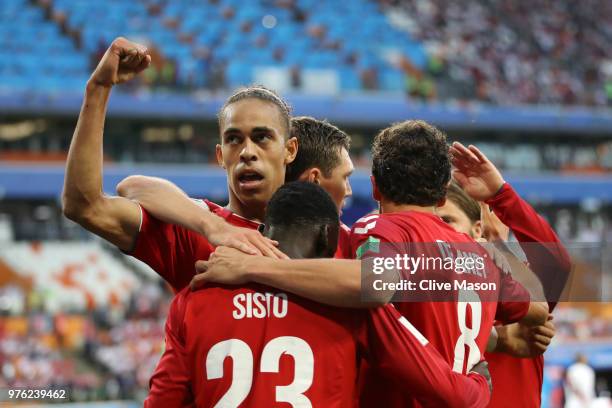 Yussuf Yurary Poulsen of Denmark celebrates with teammates after scoring his team's first goal during the 2018 FIFA World Cup Russia group C match...