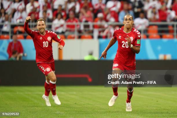 Yussuf Yurary Poulsen of Denmak celebrates after scoring his team's first goal with team mate Christian Eriksen during the 2018 FIFA World Cup Russia...