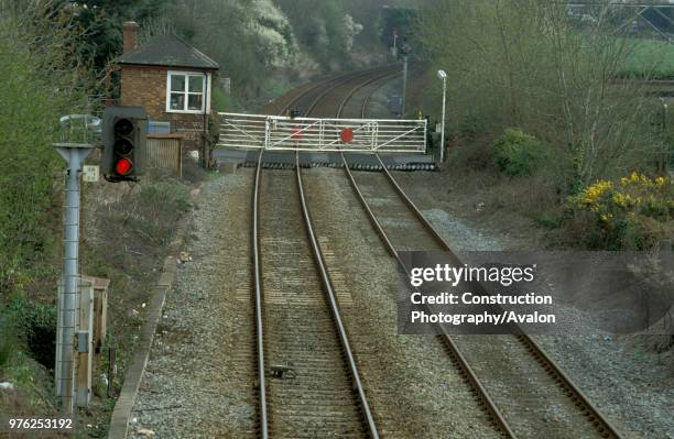 Signals, track and level crossing at Llanfair PG c2002.