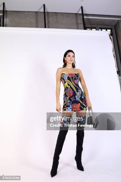 Kendall Jenner is seen backstage ahead of the Versace show during Milan Men's Fashion Week Spring/Summer 2019 on June 16, 2018 in Milan, Italy.