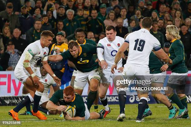 South Africa's hooker Akker van der Merwe protects South Africa's loose head prop Steven Kitshoff as he rolls with the ball during the second test...