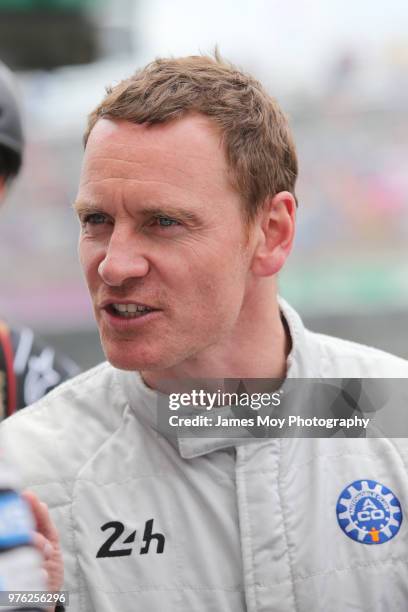Actor Michael Fassbender of Ireland on the grid before the start of the Le Mans 24 Hour race on June 16, 2018 in Le Mans, France.