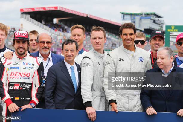 Fernando Alonso of Spain and Toyota Gazoo Racing with actor Michael Fassbender of Ireland; tennis player Rafael Nadal of Spain, Jean Todt of France...