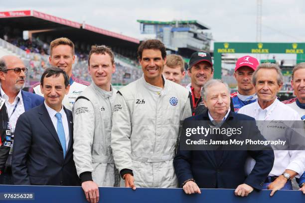 Actor Michael Fassbender of Ireland with tennis player Rafael Nadal of Spain, Jean Todt of France and FIA President, and Jacky Ickx of Belgium, on...