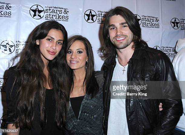 Actress Giglianne Braga, singer/songwriter Kara DioGuardi and musician Justin Gaston attend A Place Called Home's 4th Annual Celebrity Bowling and...