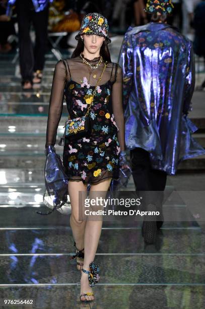 Vittoria Ceretti walks the runway at the Versace show during Milan Men's Fashion Week Spring/Summer 2019 on June 16, 2018 in Milan, Italy.