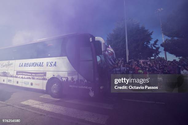 Real Valladolid fans light flares as the team bus arrives prior the La Liga 123 play off match between Real Valladolid and Club Deportivo Numancia at...