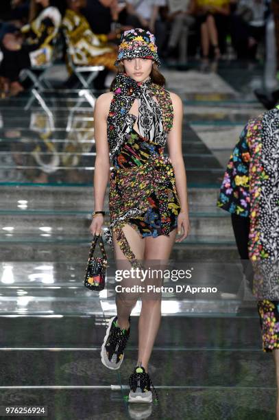 Grace Elizabeth walks the runway at the Versace show during Milan Men's Fashion Week Spring/Summer 2019 on June 16, 2018 in Milan, Italy.