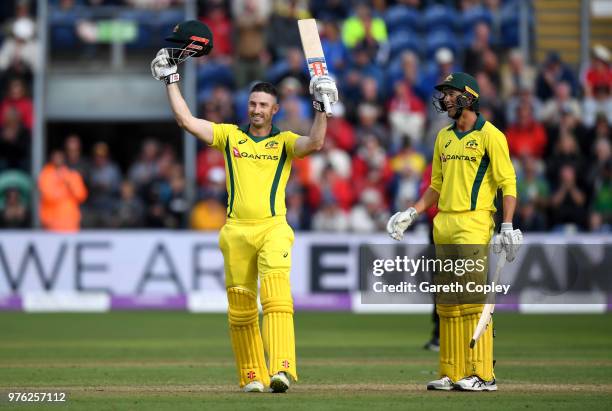 Shaun Marsh of Australia celebrates reaching his century with teammate Ashton Agar during the 2nd Royal London ODI between England and Australia at...