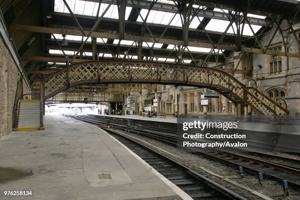 View of one of the footbridges at Perth station, Parthshire, showing the staircase access to the bridge and the platform canopy 30th May 2007.