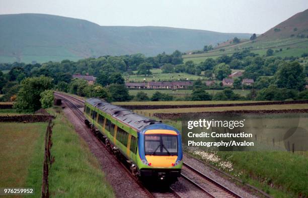 Central Trains class 170 Turbostar travells through the Peak District national park on approach to Edale station in the Hope Valley, 2003.