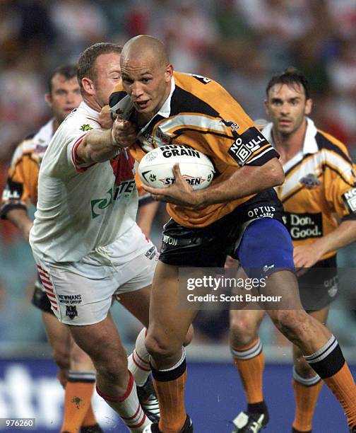 Tyran Smith of the Tigers in action during the round 2 NRL match between the St George Illawarra Dragons and Wests Tigers played at the Sydney...