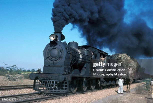 Malakwal Junction on the Pakistan's Punjab with British built inside cylinder SGS Class 0-6-0 No 4127. A scene complete with British Semaphore...