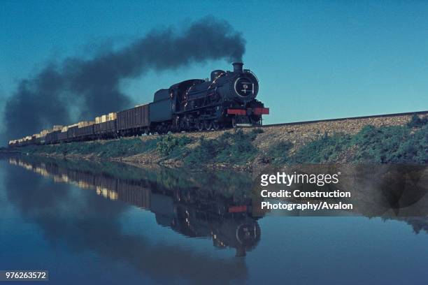 South African Railways 16c Class Pacific heads a freight train over the tidal Swartkops River in Port Elizabeth on Saturday 7th July 1973.
