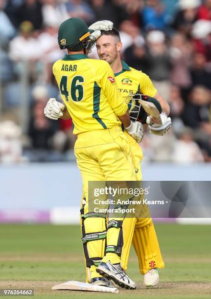 Australia's Shaun Marsh celebrates reaching his century with team mate Ashton Agar during the Royal London One-Day Series 2nd ODI between England and...