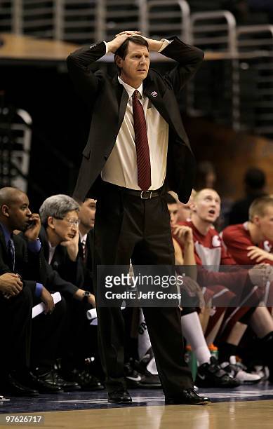 Washington State Cougars head coach Ken Bone reacts against the Oregon Ducks during the first round of the Pac-10 Basketball Tournament at Staples...
