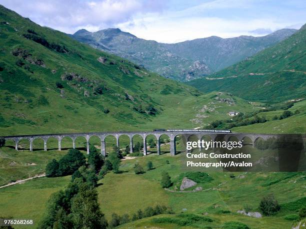 West Highland Line. No 37188 crosses Glenfinnan viaduct with the 14:05 ex Fort William for Mallaig. , United Kingdom.