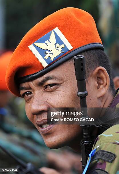 An Indonesian air force anti-terror commando prepares for a parade at the National Monument in Jakarta on March 11, 2010 during the opening the joint...