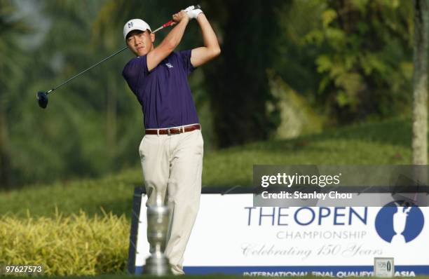 Eric Chun of South Korea watches his tee shot on the 1st tee during Asian International Final Qualifying for The Open at Saujana Golf and Country...