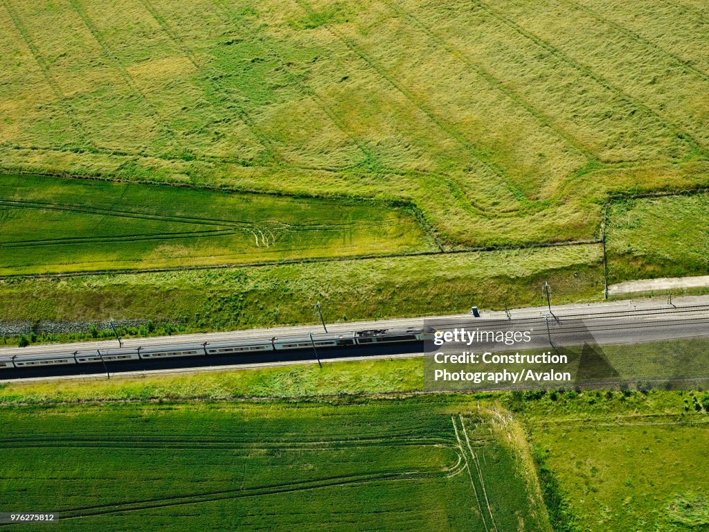 Aerial view of a train near River Medway, Kent, UK