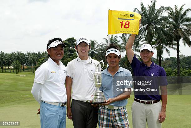Danny Chia of Malaysia, Noh Seung-Yul of South Lorea and Hiroyuki Fujita of Japan and Eric Chun of South Korea pose with the Claret Jug after...