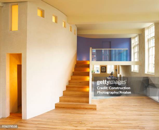 Modern open plan split-level loft apartment. Designed and built by modernarc.