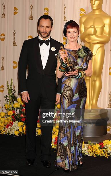 Presenter/designer Tom Ford and costume designer Sandy Powell, winner of Best Costume Design award for 'The Young Victoria and ' pose in the press...