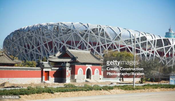 Taoist temple in front of Beijing National Stadium, also known as the Bird's Nest, Beijing, China.