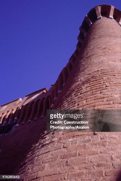 Curved exterior wall of castle at Perpignan, France.